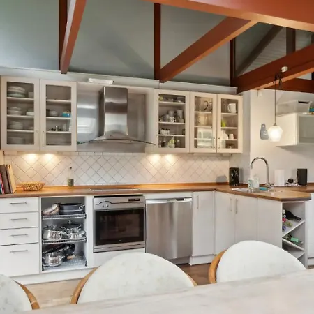 Traditional With Garden Near Water